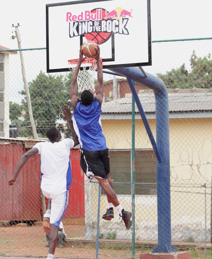 accra-man-slam-dunking-basketball