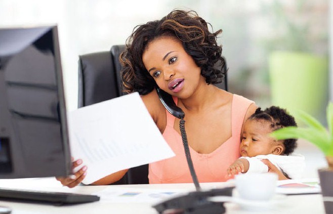 woman-with-child-working-from-home